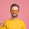 Cheerful blond man pointing away 2022 11 23 00 43 31 utc 1.jpg